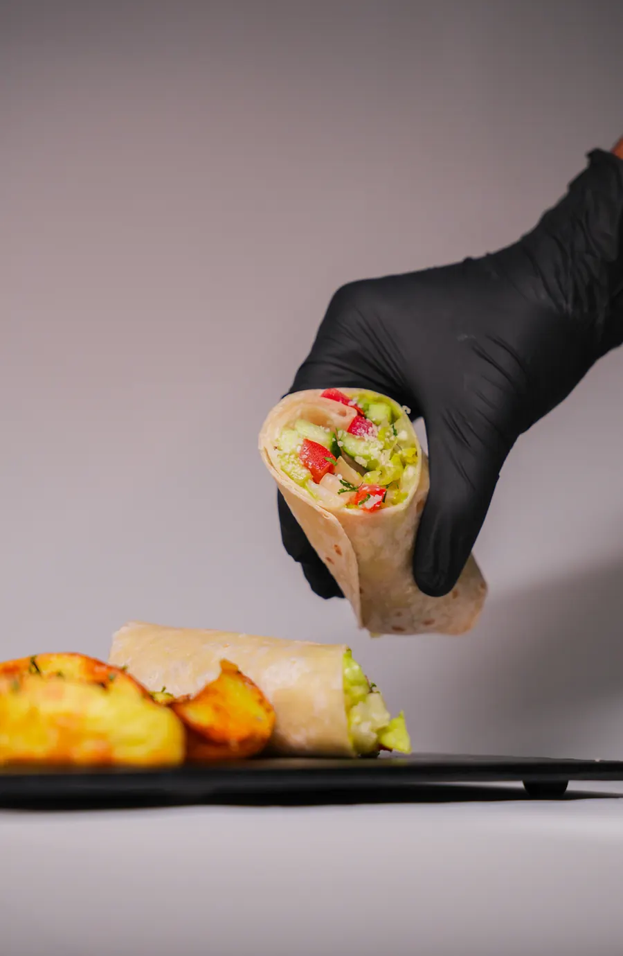 A fresh garden wrap with roast potatoes